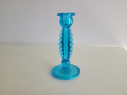 Old blue glass candle holder with beaded glass decoration