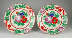Pair of marked 1M409 floral granite wall plates 23 cm