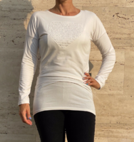 White elongated top with heart pattern