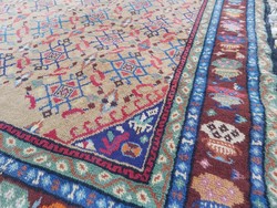Huge hand-knotted antique woolen Persian rug, heavily patinated 240 x 310 cm