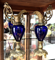 A pair of decorative carafes for pouring drinks, antique, blue decorative glass with copper elements