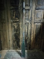 Oar, dark green old wooden oar for sale as decoration.