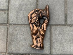 Bronzed African woman wall decoration