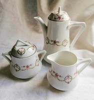 Porcelain teapot, spout and sugar bowl