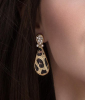Golden animal print earrings with white crystals, very beautiful.