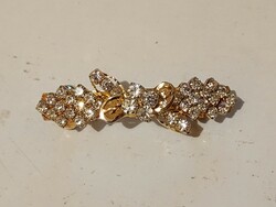 X. Discount 550.- Brand new gold-plated metal hair clip