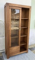 Solid wood cabinet with glass door on one side, part of a set ￼