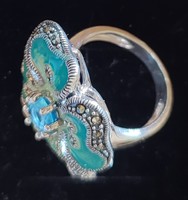 Decorative silver ring with stone inlay and enamel decoration