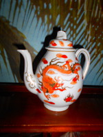 Antique hand-painted porcelain jug with a traditional dragonfly pattern