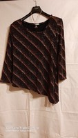 Luxus minőségü női  hosszuujju   felső  ( lurex) uj állapotu, divatos- alul trapézos, oldalt köthető