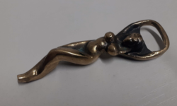 Old copper beer opener in the shape of a woman