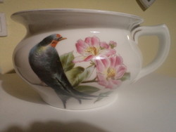 Old, swallow-shaped porcelain potty or bed bowl