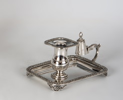 Silver manual candle holder with tap