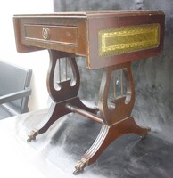 Castor side table with lanyard legs and drawers