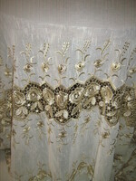 Luxury curtain with flowers embroidered with gold in beautiful vintage material