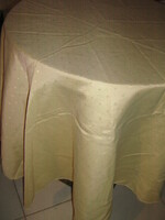 Beautiful round silk damask tablecloth with a small pattern