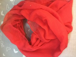 Young, solid red German round scarf made of gauze-like material