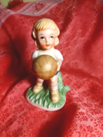 Small child with a ball, porcelain nipp