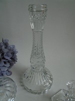 Glass candle holder. Its height is 22 cm.