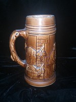 Brown ceramic mug with dramatic relief pattern, 17 cm