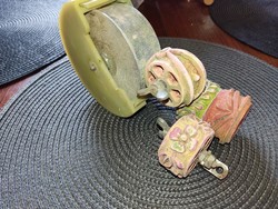 Old paint rollers with container