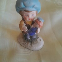 Charming child with doll 8 cm