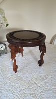 Small table with elephant legs carved from exotic wood, statue holder with pot holder