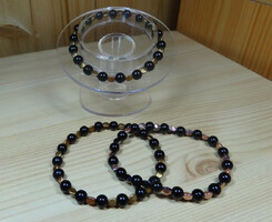 Bracelet made of black and gold-colored glass beads, the bead is 6 mm