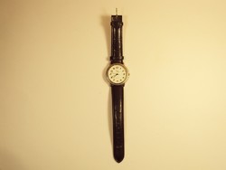Retro old watch wristwatch with time wise quartz inscription
