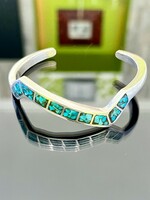 Unique silver bracelet with turquoise stones