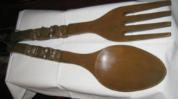 Peasant decor with giant carved wooden spoon and wooden fork