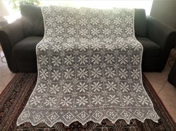 Crocheted lace curtain with checkered bottom