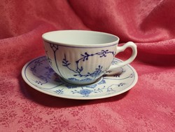 Antique porcelain coffee cup with immortelle pattern