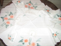 A beautiful white tablecloth with a Christmas pattern