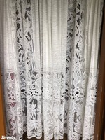 Lace curtain with flower pattern