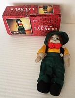 Der kleine lausbub is an old German decorative doll