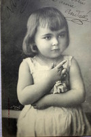 Antique painting-like photo postcard of a charming little girl