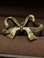 Bow-shaped gold brooch, brooch .585