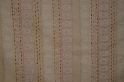 Lined tablecloth with a woven pattern in its large material