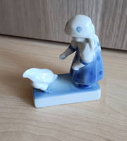Zsolnay was designed by András Sinkó, a little girl feeding a porcelain hen