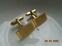 Gold-plated cuff with raised wavy pattern