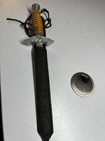 Old dagger with eagle pattern