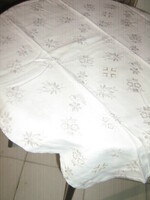 Beautiful damask tablecloth with embroidered flower pattern
