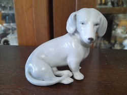 Rare low German, Germany Gotha e. Pfeffer 1890-1913 sitting dachshund porcelain dog figure. 7 Cm.