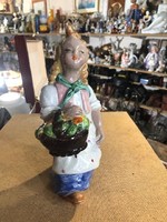 Hops ceramics, girl selling flowers, 18 cm tall.