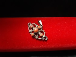 Antique silver pendant with coral