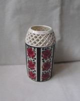 Openwork vase with a rose pattern
