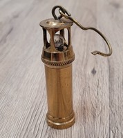 Old copper mini mining lamp, carbide lamp.