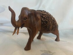 Eastern-style lucky elephant carved from wood. 17 cm