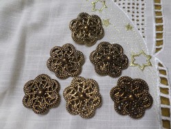 Buttons with metal effect lace tabs. Diameter 3 cm.